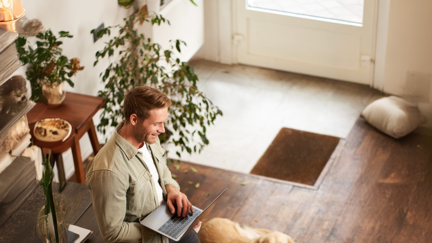 vertical-shot-handsome-businessman-young-office-with-pet-scaled-1